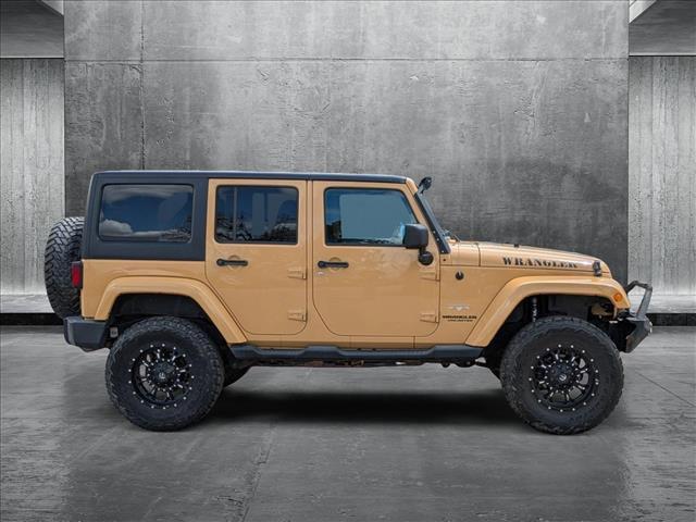 used 2013 Jeep Wrangler Unlimited car, priced at $19,815