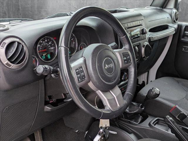 used 2016 Jeep Wrangler Unlimited car, priced at $19,990