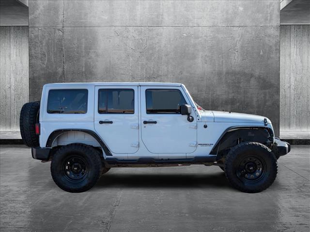 used 2016 Jeep Wrangler Unlimited car, priced at $24,990