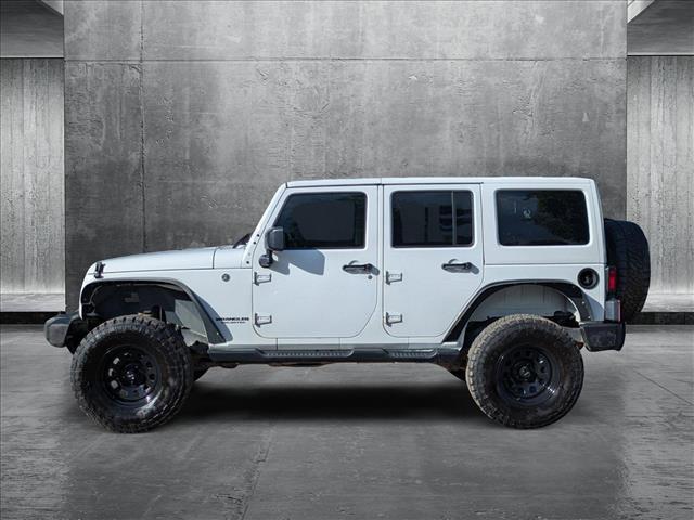 used 2016 Jeep Wrangler Unlimited car, priced at $24,990
