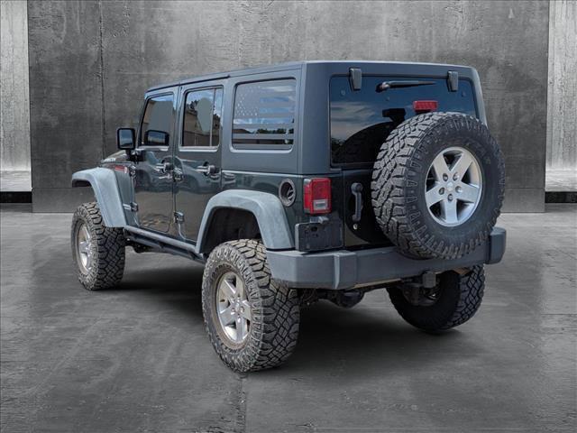 used 2011 Jeep Wrangler Unlimited car, priced at $19,590