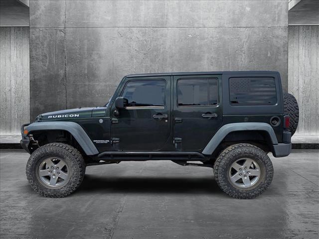 used 2011 Jeep Wrangler Unlimited car, priced at $19,590