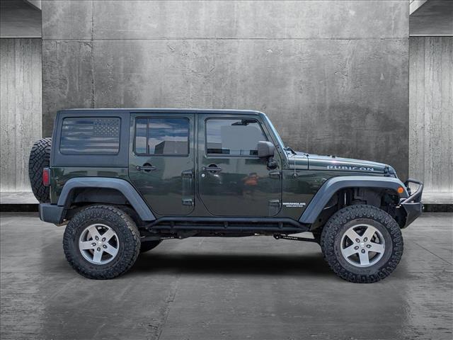 used 2011 Jeep Wrangler Unlimited car, priced at $19,590