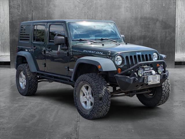 used 2011 Jeep Wrangler Unlimited car, priced at $19,590