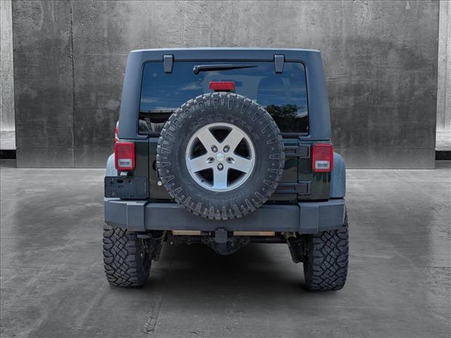 used 2011 Jeep Wrangler Unlimited car, priced at $19,590