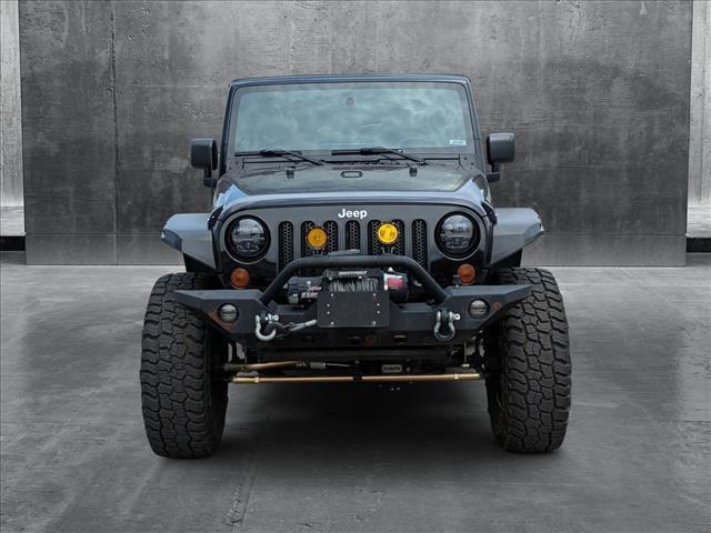 used 2012 Jeep Wrangler Unlimited car, priced at $16,790