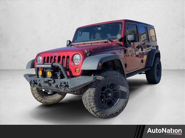 used 2013 Jeep Wrangler Unlimited car, priced at $17,650