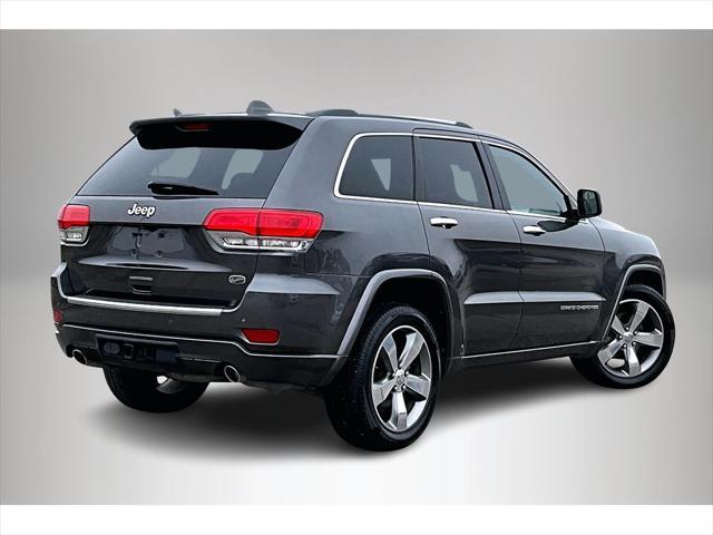 used 2014 Jeep Grand Cherokee car, priced at $13,391