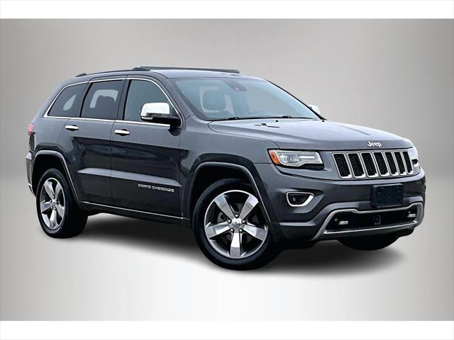 used 2014 Jeep Grand Cherokee car, priced at $13,391