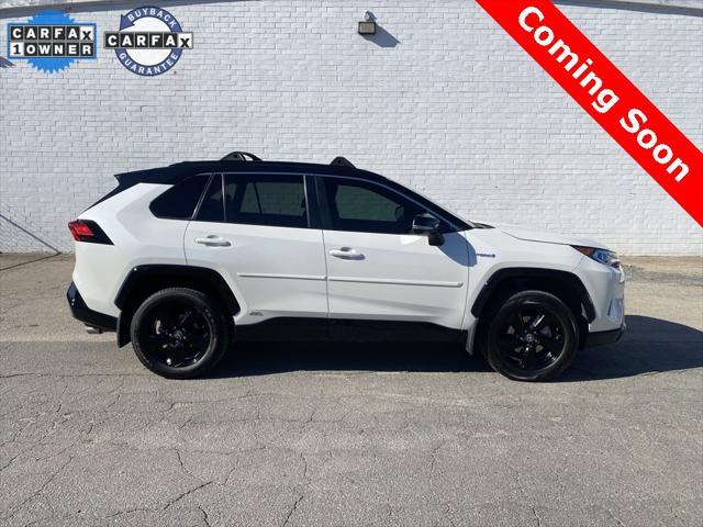 used 2021 Toyota RAV4 Hybrid car, priced at $27,985