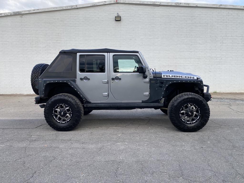 used 2013 Jeep Wrangler Unlimited car, priced at $21,044