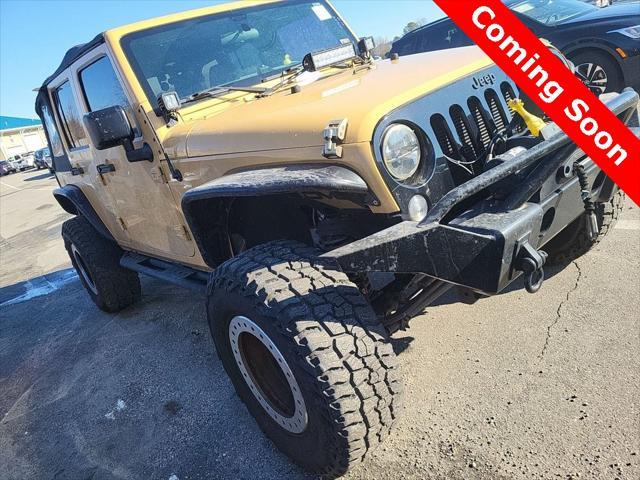 used 2014 Jeep Wrangler Unlimited car, priced at $17,985