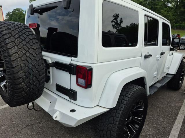 used 2015 Jeep Wrangler Unlimited car, priced at $25,909
