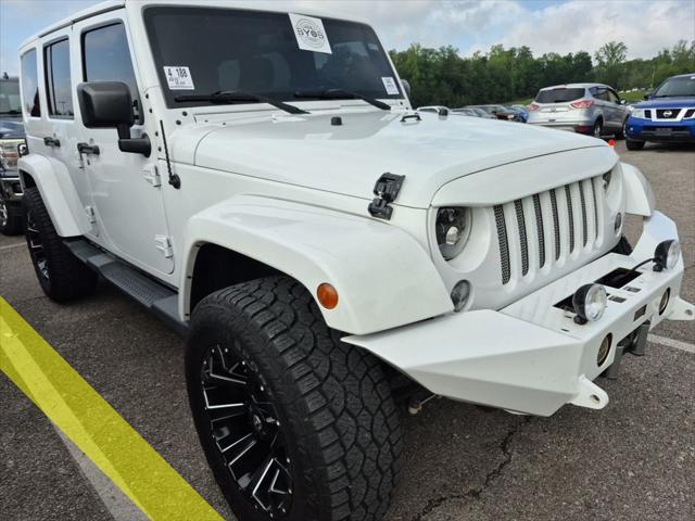 used 2015 Jeep Wrangler Unlimited car, priced at $25,909