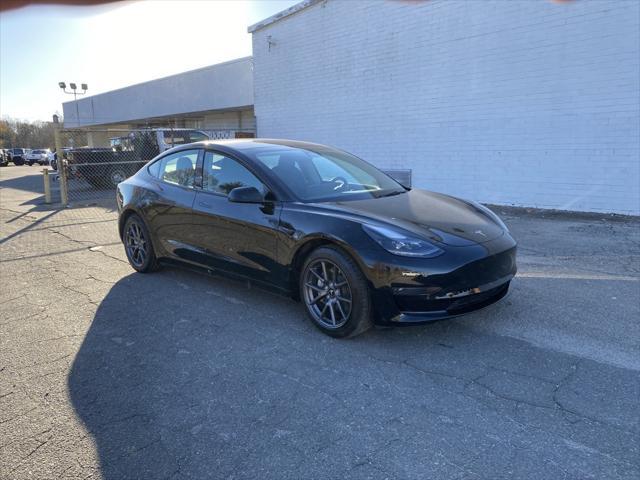 used 2023 Tesla Model 3 car, priced at $26,285