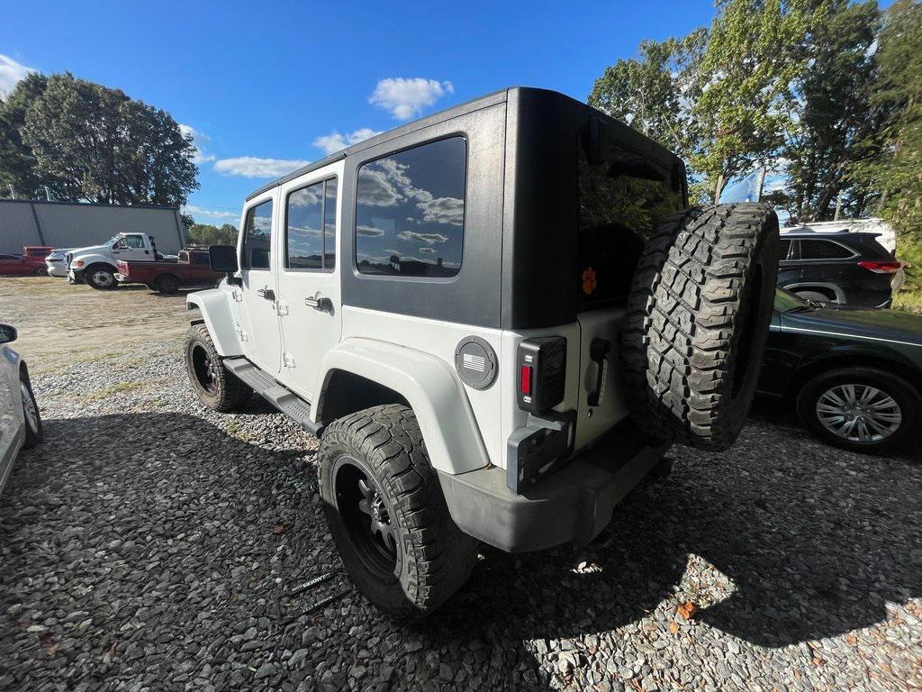 used 2013 Jeep Wrangler Unlimited car, priced at $14,999
