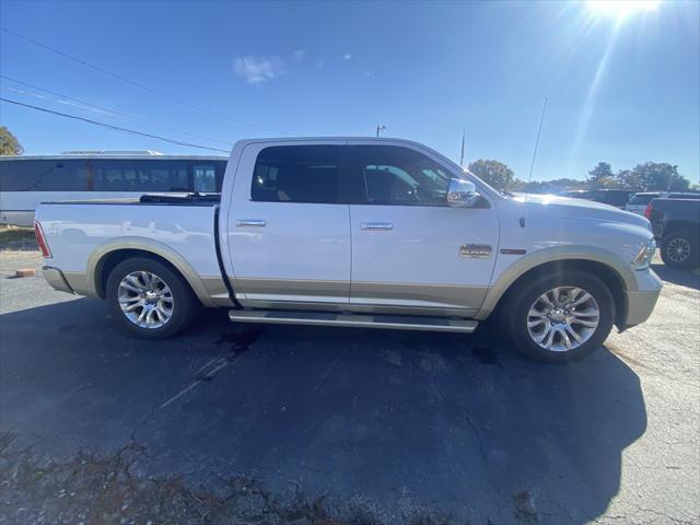 used 2015 Ram 1500 car, priced at $19,285