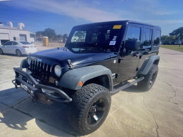 used 2014 Jeep Wrangler Unlimited car, priced at $19,506