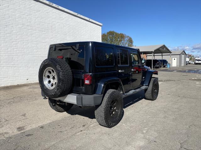 used 2013 Jeep Wrangler Unlimited car, priced at $18,585