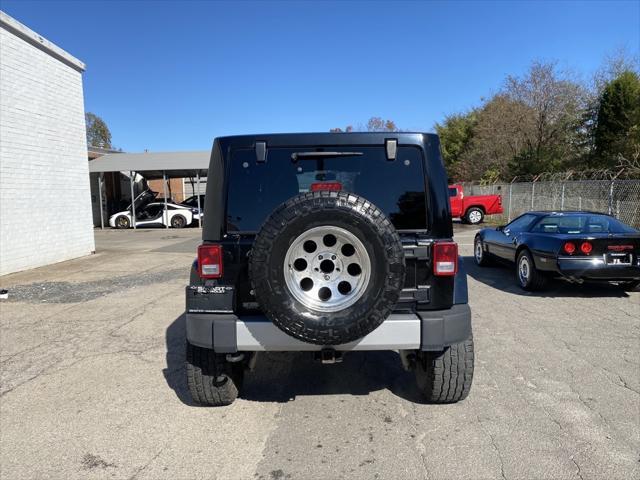 used 2013 Jeep Wrangler Unlimited car, priced at $18,585