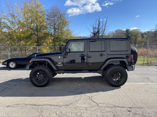 used 2013 Jeep Wrangler Unlimited car, priced at $18,585