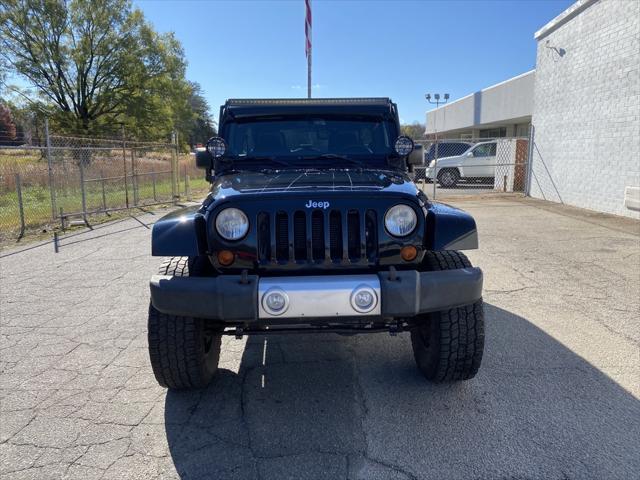 used 2013 Jeep Wrangler Unlimited car, priced at $18,585