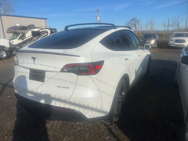 used 2023 Tesla Model Y car, priced at $36,885