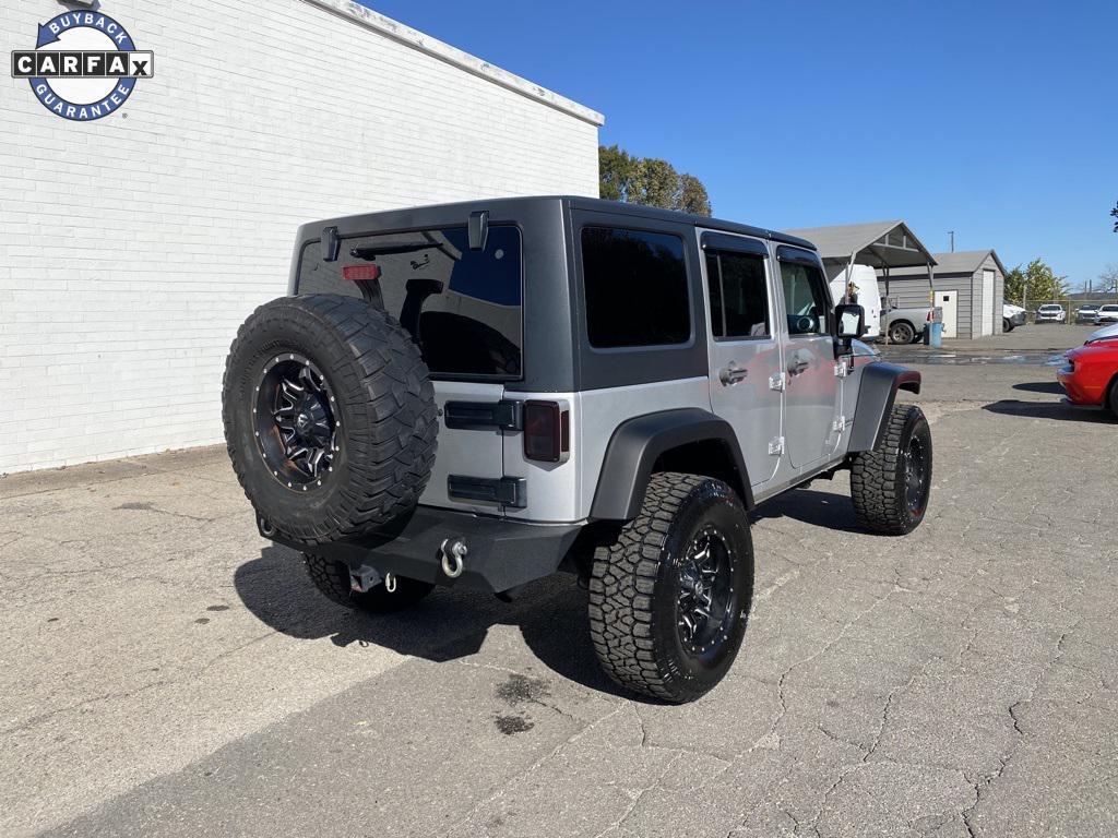 used 2011 Jeep Wrangler Unlimited car, priced at $12,998