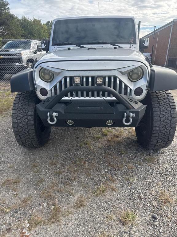 used 2011 Jeep Wrangler Unlimited car, priced at $13,998