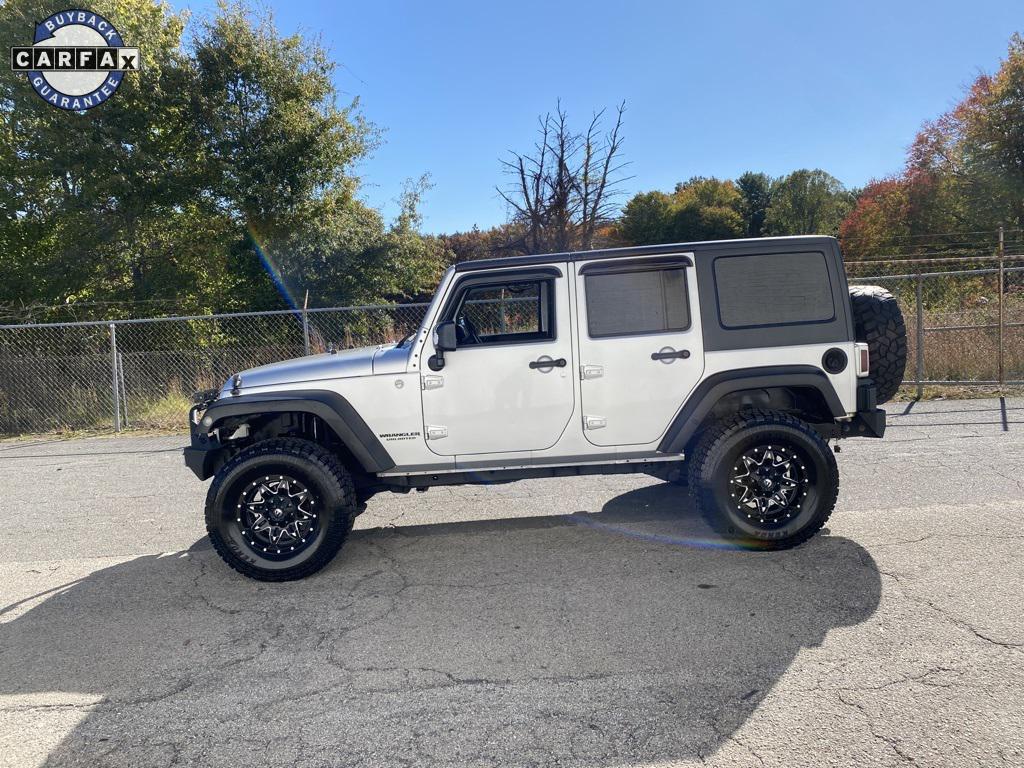 used 2011 Jeep Wrangler Unlimited car, priced at $12,998