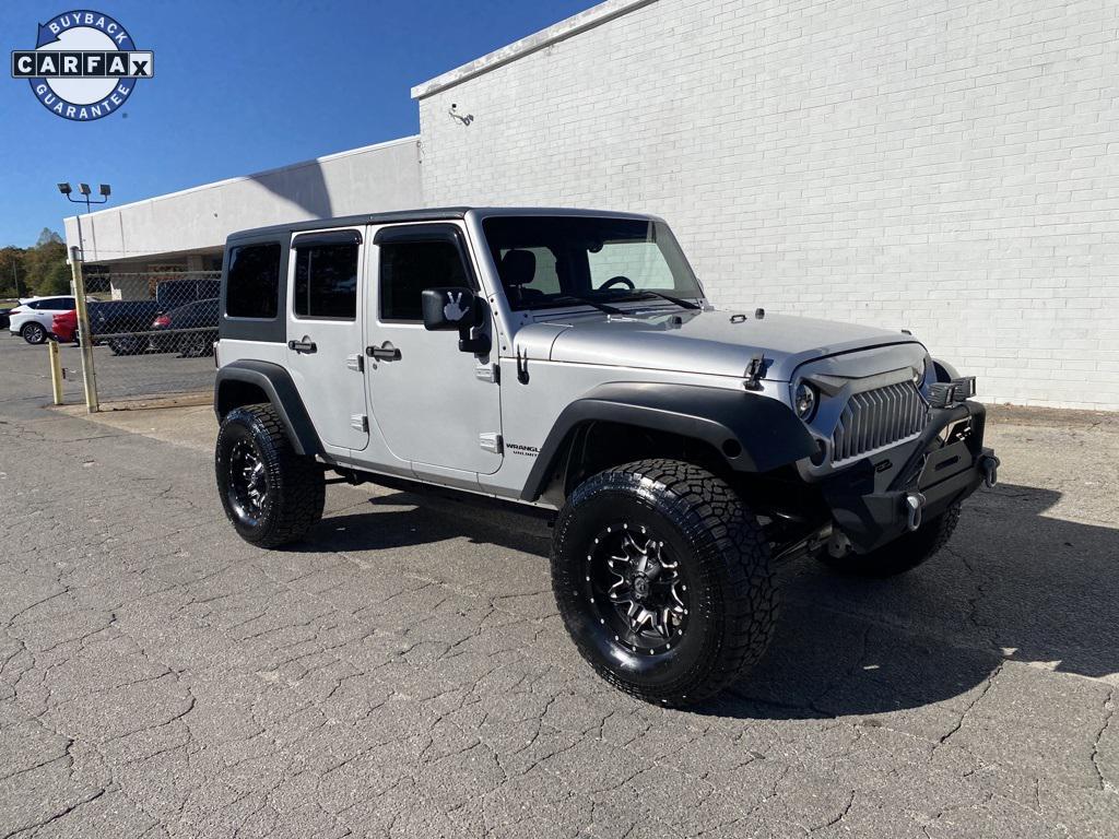used 2011 Jeep Wrangler Unlimited car, priced at $12,998