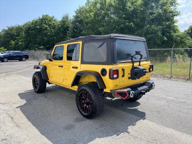 used 2018 Jeep Wrangler Unlimited car, priced at $23,106