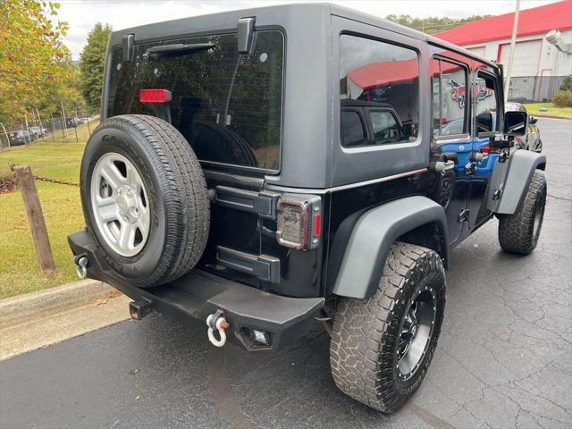 used 2016 Jeep Wrangler Unlimited car, priced at $22,385