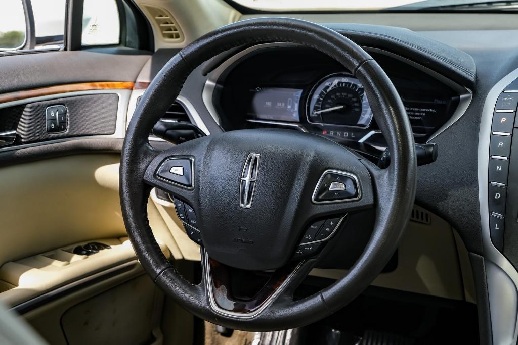 used 2014 Lincoln MKZ Hybrid car, priced at $8,999