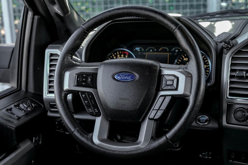 used 2015 Ford F-150 car, priced at $23,999