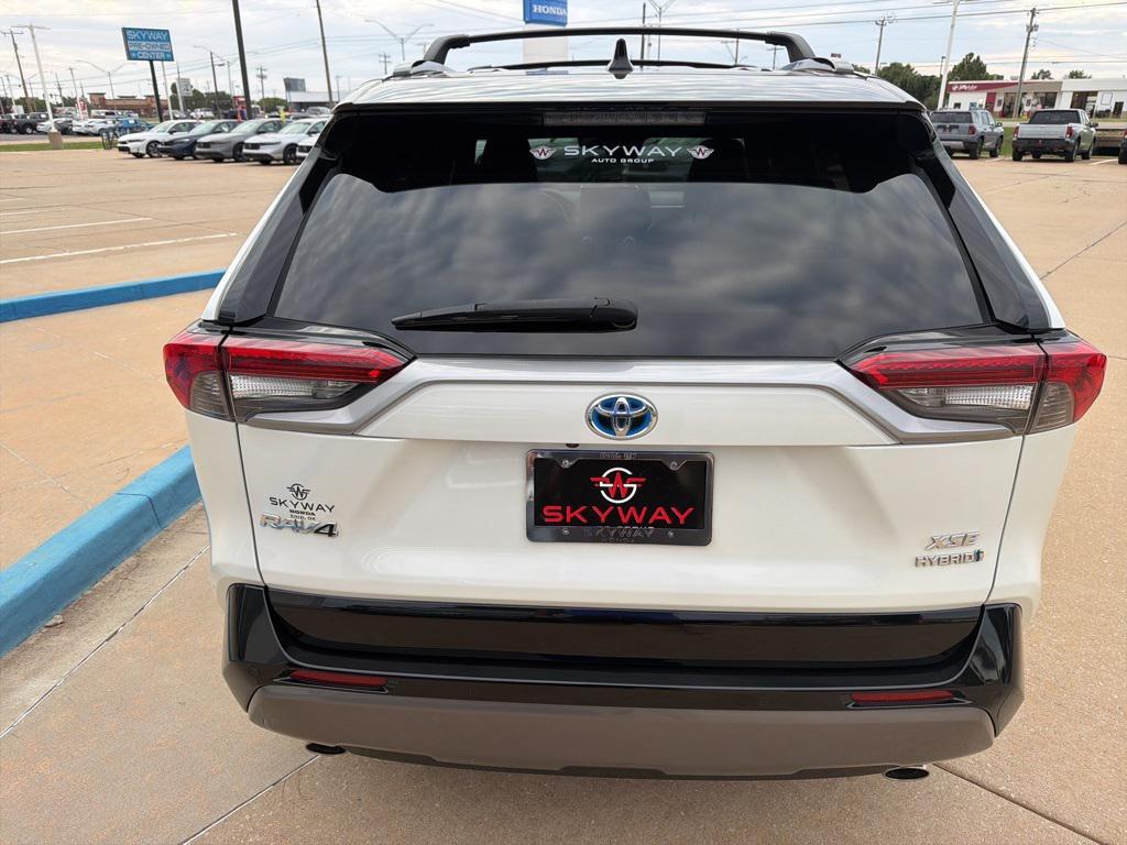 used 2021 Toyota RAV4 Hybrid car, priced at $34,290