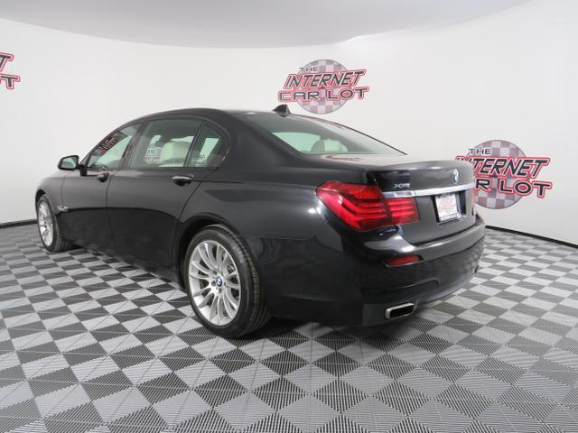 used 2014 BMW 750 car, priced at $16,995