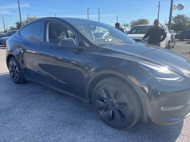 used 2024 Tesla Model Y car, priced at $40,697