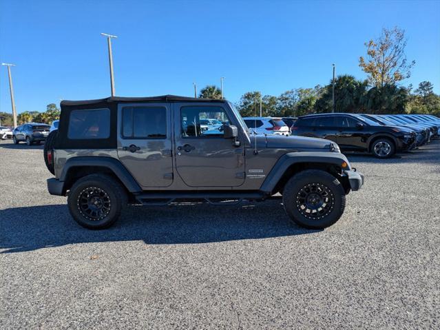 used 2018 Jeep Wrangler JK Unlimited car, priced at $19,888