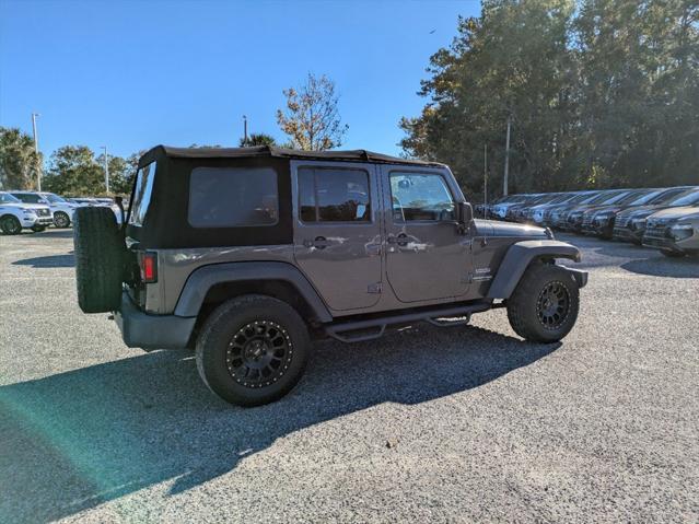 used 2018 Jeep Wrangler JK Unlimited car, priced at $19,888