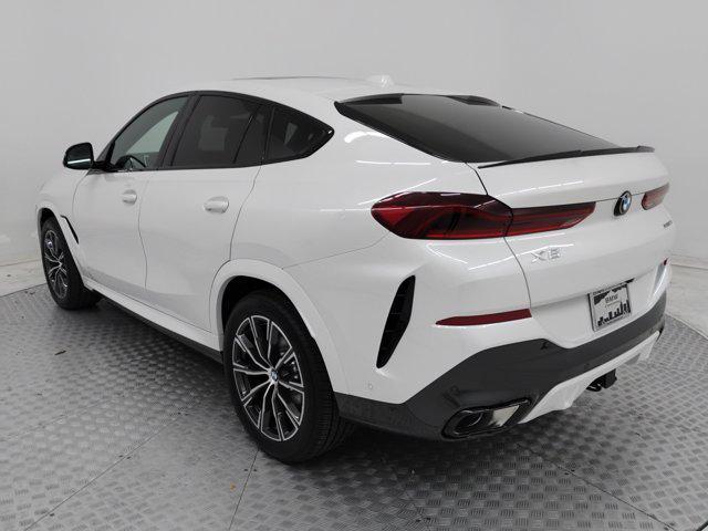 new 2025 BMW X6 car, priced at $83,545