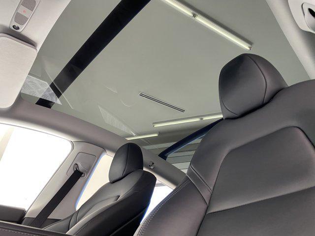 used 2023 Tesla Model Y car, priced at $32,999