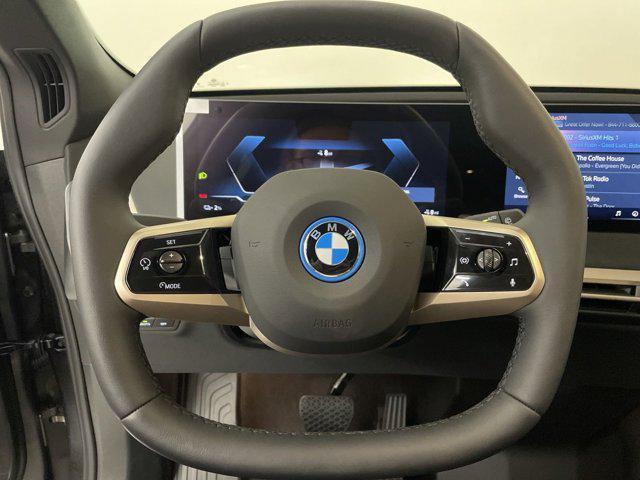 new 2025 BMW iX car, priced at $96,075