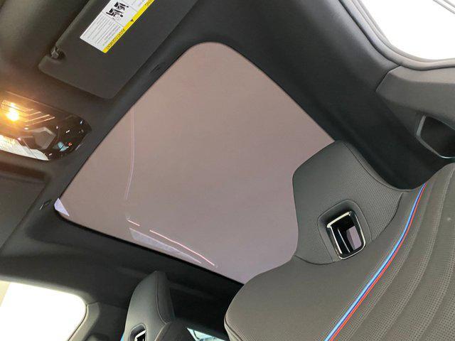 new 2026 BMW iX car, priced at $103,950