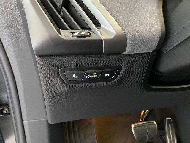 new 2026 BMW iX car, priced at $103,950