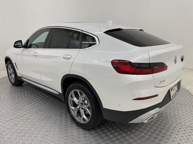 used 2025 BMW X4 car, priced at $54,873