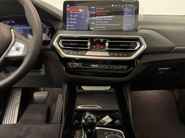 used 2025 BMW X4 car, priced at $54,873