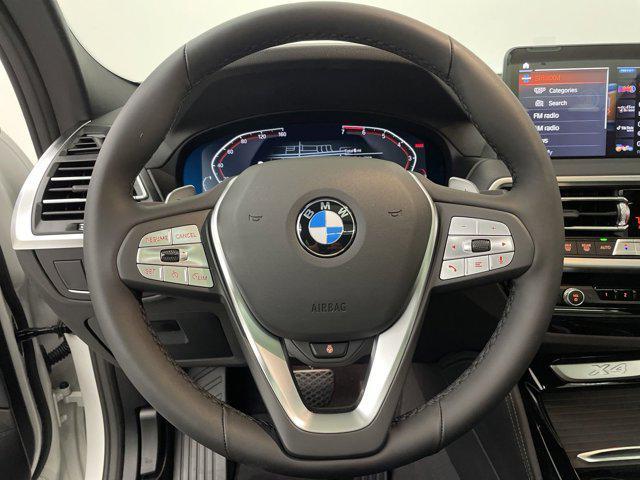used 2025 BMW X4 car, priced at $54,873