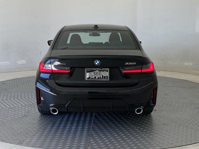 new 2025 BMW 330 car, priced at $53,975