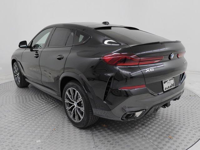 new 2025 BMW X6 car, priced at $81,895